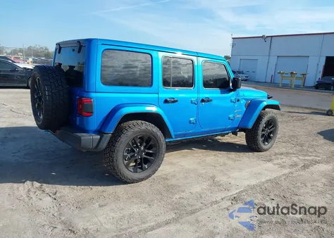 2023 Jeep Wrangler 4Xe Sahara 4X4 z USA, uszkodzony, nr VIN 1C4JJXP63PW597849